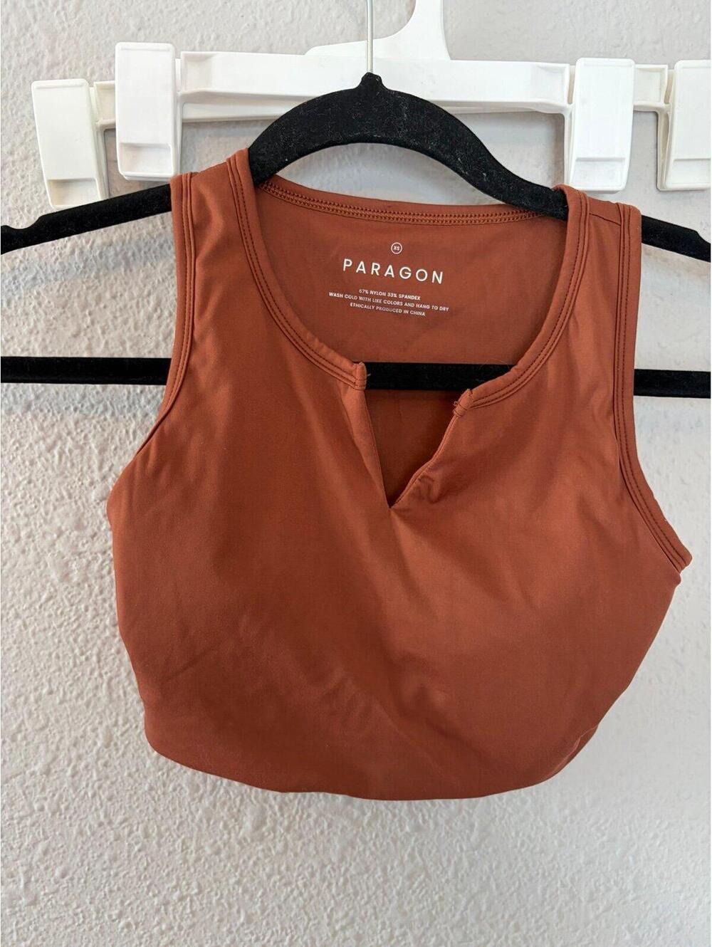 Paragon brown v sports bra size XS. Has removable pads